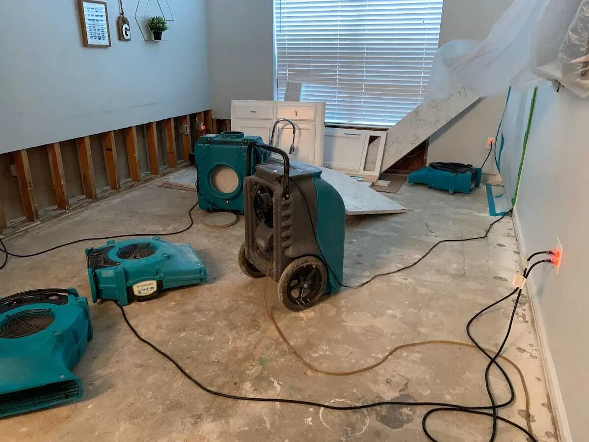 Dehumidifier in flood-cut room for Water Damage Restoration in Verdigris